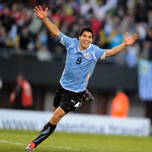 Uruguayan forward Luis Suarez celebrates at the end of the final against Paraguay (3-0) of the 2011 Copa America football tournament held at the Monumental stadium in Buenos Aires, on July 24, 2011. AFP PHOTO / ANTONIO SCORZA